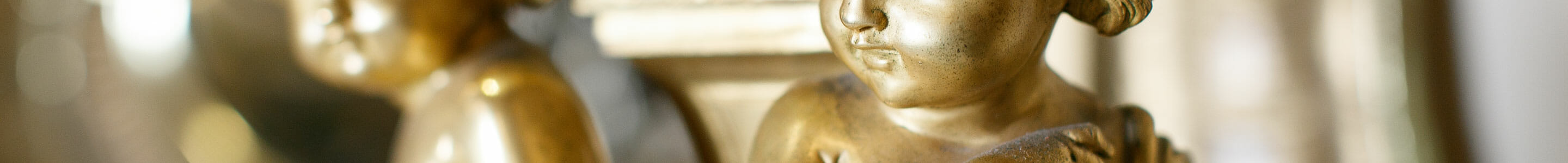 Close-up of cherub statue