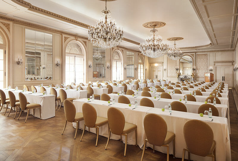 Versailles Ballroom set classroom style with green apples