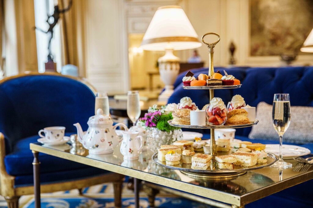 tea scape on a table in front of blue furniture