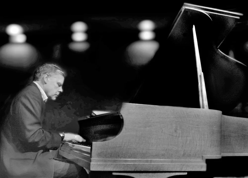 Adam Wolff playing the piano